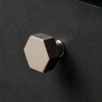 The 38mm "Vanguard" Hexagonal Cabinet Knob in Polished Nickel Mounted on a Charcoal Coloured Kitchen Drawer - Digital Illustration The 38mm "Vanguard" Hexagonal Cabinet Knob in Polished Nickel Mounted on a Charcoal Coloured Kitchen Drawer - Digital Illustration