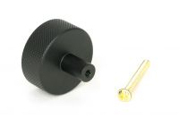 The 38mm "Vesper" Knurled Edge Cabinet Knob in Matt Black on a White Background Shown from Behind with the Screw