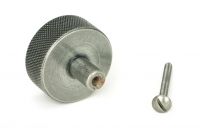 The 38mm "Vesper" Knurled Edge Cabinet Knob in Pewter Mounted on a White Background Shown ~From Behind with the Screw