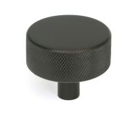 The 38mm Knurled Cabinet Knob (No Rose) in Aged Bronze Shown Upright on a White Background The 38mm Knurled Cabinet Knob (No Rose) in Aged Bronze Shown Upright on a White Background