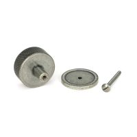 The 38mm Knurled Cabinet Knob on a Plain Rose in Pewter Showing the Separate Components and Supplied Fitting The 38mm Knurled Cabinet Knob on a Plain Rose in Pewter Showing the Separate Components and Supplied Fitting