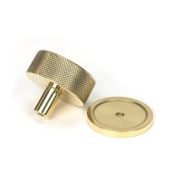 The 38mm Knurled Cabinet Knob on a Plain Rose in Polished Brass Displayed in Separate Sections on a White Background The 38mm Knurled Cabinet Knob on a Plain Rose in Polished Brass Displayed in Separate Sections on a White Background