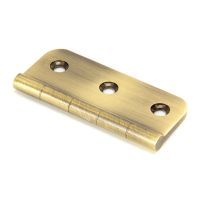 The 3" Traditional Mock Window Hinge in Aged Brass on a White Background on a White Background The 3" Traditional Mock Window Hinge in Aged Brass on a White Background on a White Background