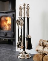 The 40cm Tudor Fireside Companion Set - Nickel & Black Iron Next to a White Fireplace in a Modern Home Interior - Digital Illustration The 40cm Tudor Fireside Companion Set - Nickel & Black Iron Next to a White Fireplace in a Modern Home Interior - Digital Illustration