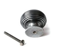 The 40mm "Garrison" Ribbed Beehive Knob in Pewter on a White Background Shown from Behind with the Screw.jpeg