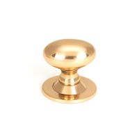 The Polished Bronze 40mm Traditional Oval Cabinet Knob Shown Upright on a White Background The Polished Bronze 40mm Traditional Oval Cabinet Knob Shown Upright on a White Background