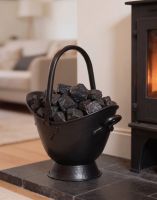 The 43cm "Waterloo" Black Iron Coal Bucket Placed Next to a Classic Log Burner Stove - Digital Illustration The 43cm "Waterloo" Black Iron Coal Bucket Placed Next to a Classic Log Burner Stove - Digital Illustration
