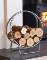 The 45cm Pewter Finish Contemporary Circular Log Rack & Holder on a Black Stone Hearth in a Modern Home - Digital Illustration The 45cm Pewter Finish Contemporary Circular Log Rack & Holder on a Black Stone Hearth in a Modern Home - Digital Illustration
