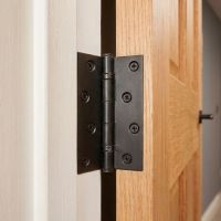 The 4" Beeswax finish Iron Butt Hinge Shown Supporting a Door inside a Modern Home - Digital Illustration The 4" Beeswax finish Iron Butt Hinge Shown Supporting a Door inside a Modern Home - Digital Illustration