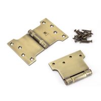 The 4" Heavy Duty Parliament Door Hinges (Pair) in Aged Brass Shown on a White Background as a Pair with Supplied Screws