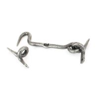 The 4 Inch Forged Iron Cabin Hook in a Pewter Finish on a White Background The 4 Inch Forged Iron Cabin Hook in a Pewter Finish on a White Background