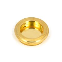 The 60mm Art Deco Round Flush Pull Handle in Polished Brass shown up close on a White Background