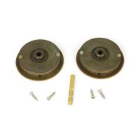 The 60mm Art Deco Round Sliding Pocket Door Privacy Set in Aged Brass Shown from Behind with Spindle and Screws
