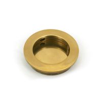 The 60mm Classic Round Flush Pull Handle in Aged Brass Shown from the Front on a White Background