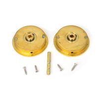 The 60mm Classic Round Sliding Pocket Door Privacy Set in Polished Brass Shown with Supplied Spindle and Fitting Screws