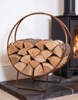 The 69.5cm Copper Contemporary Circular Log Rack & Holder in a Modern Living Room next to a Log Burner - Digital Illustration The 69.5cm Copper Contemporary Circular Log Rack & Holder in a Modern Living Room next to a Log Burner - Digital Illustration