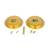 The 75mm Art Deco Round Sliding Pocket Door Privacy Set in Polished Brass Shown with Supplied Spindle and Fitting Screws