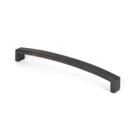 The 8.25" Linear Bridge Pull Handle in Beeswax Stood Upright on a White Background