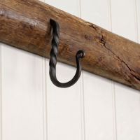 The 89mm Blacksmith Black Cup Hook Fixed in a Wooden Beam in a Country Kitchen - Digital Illustration The 89mm Blacksmith Black Cup Hook Fixed in a Wooden Beam in a Country Kitchen - Digital Illustration