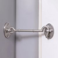 The 8 Inch Satin Chrome Cabin Hook Loose Ring Type Holding open a White Door in a Modern Home - Digital Illustration