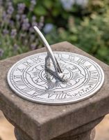 The 95mm Bright Chrome "Suns Tyne" Mini Sundial On Top of a Garden Pillar in a Rustic Garden - Digital Illustration The 95mm Bright Chrome "Suns Tyne" Mini Sundial On Top of a Garden Pillar in a Rustic Garden - Digital Illustration