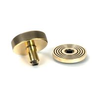 The Aged Brass Knurled Centre Door Knob on Beehive Rose Displayed in Separate Sections The Aged Brass Knurled Centre Door Knob on Beehive Rose Displayed in Separate Sections