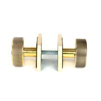 The Aged Brass Knurled Mortice/Rim Knob Set on a Square Rose Shown Screwed Together from the Side The Aged Brass Knurled Mortice/Rim Knob Set on a Square Rose Shown Screwed Together from the Side