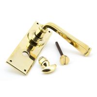 The Aged Brass Sleek Architectural Privacy Suite Bathroom Lever Handles Shown on its Side The Aged Brass Sleek Architectural Privacy Suite Bathroom Lever Handles Shown on its Side