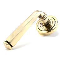 The Aged Brass Tapered Lever on Art Deco Rose Set on a White Background The Aged Brass Tapered Lever on Art Deco Rose Set on a White Background