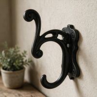 The Alexis Door Hook Fitted onto a Sand Coloured Wall Shown Close up - Digital Illustration The Alexis Door Hook Fitted onto a Sand Coloured Wall Shown Close up - Digital Illustration