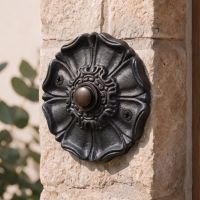 The Antique Iron Tudor Rose Door Bell Push on the Front of a House on a Brick Wall - Digital Illustration The Antique Iron Tudor Rose Door Bell Push on the Front of a House on a Brick Wall - Digital Illustration