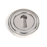 The Art Deco Concealed Standard Keyhole Escutcheon in Polished Stainless Steel Shown on a White Background