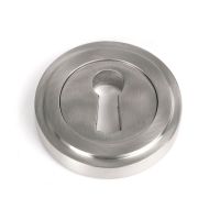 The Art Deco Concealed Standard Keyhole Escutcheon in Satin Stainless Steel Shown on a White Background