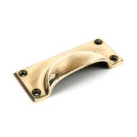 The Art Deco Cup Drawer Pull with Backplate in Aged Brass Shown on its Side on a White Background 