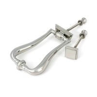 The Art Deco Geometric Loop Door Knocker in Polished Stainless Steel Shown with Door Stud on a White Background