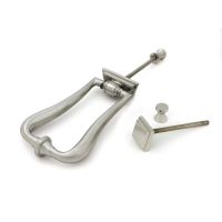 The Art Deco Geometric Loop Door Knocker in Satin Stainless Steel Shown with Separate Components on a White Background