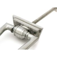The Art Deco Geometric Loop Door Knocker in Satin Stainless Steel with a Close up of the Hinge Mechanism