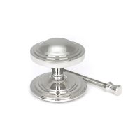 The Art Deco Stepped Rose Center Door Knob in Polished Stainless Steel Shown next to Fitting Bolt