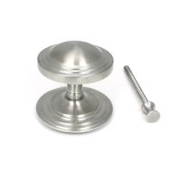 The Art Deco Stepped Rose Center Door Knob in Satin Stainless Steel Shown Upright with Fitting Bolt