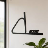 The Ascot Racecourse Black Wall Art Fitted on a Wall in a Living Room Setting - Digital Illustration