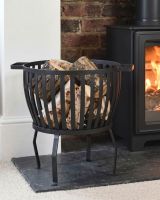 The "Barrow" Traditional Log Basket Filled with Logs Displayed to the side of a Log Burner Stove - Digital Illustration 