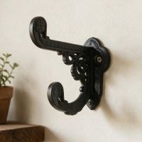 The "Basildon" Coat Hook Shown up close on a Well lit wall - Digital Illustration 