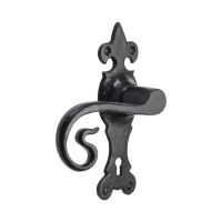 The Black Antique Fleur-de-Lis Lock Handles - Ornate Monkey Tail Keyhole Lever Pair on a White Background 