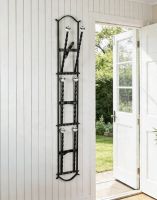 The Black Chattlehurst 3 Pair Wall Mounted Boot Rack Mounted in a Wooden Porch - Digital Illustration 