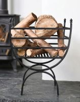 The Black Curved Iron Log Rack & Holder next to a White Fireplace with a Wood Burner Stove - Digital Illustration The Black Curved Iron Log Rack & Holder next to a White Fireplace with a Wood Burner Stove - Digital Illustration