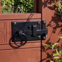 The Black Heavy Duty Thumb Latch Fitted on a Garden Gate in a Country Home - Digital Illustration