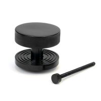 The Black Knurled Centre Door Knob on a Beehive Rose with Bolt Fitting 