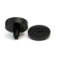 The Black Knurled Centre Door Knob on a Plain Rose Displayed in Separate Sections on a White Background 