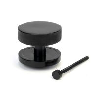 The Black Knurled Centre Door Knob on a Plain Rose with Bolt Fitting 