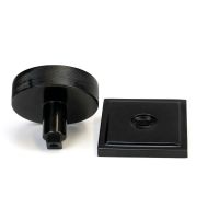 The Black Knurled Centre Door Knob on a Square Rose Displayed in Separate Sections on a White Background The Black Knurled Centre Door Knob on a Square Rose Displayed in Separate Sections on a White Background